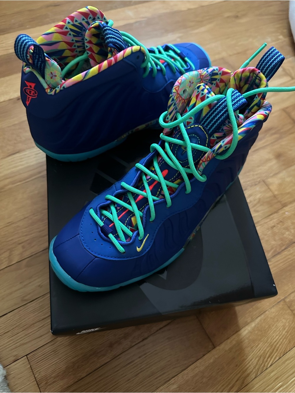 Nike Kids Blue High-Top Sneakers with Teal and Multicolor Accents